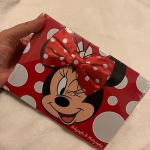Autograph and photograph, Minnie mouse album with cute bow in the front.